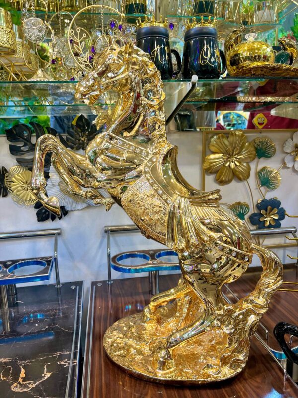 Golden hourse statue