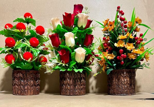 Wooden flower vase with artificial flowers