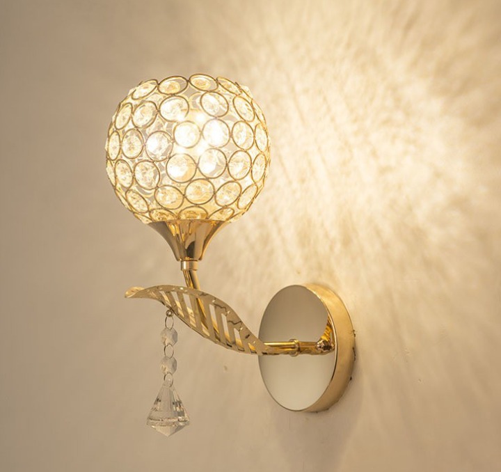 Elegant single globe crystal wall sconce with gold finish and crystal pendant, 230V wall mounted light fixture