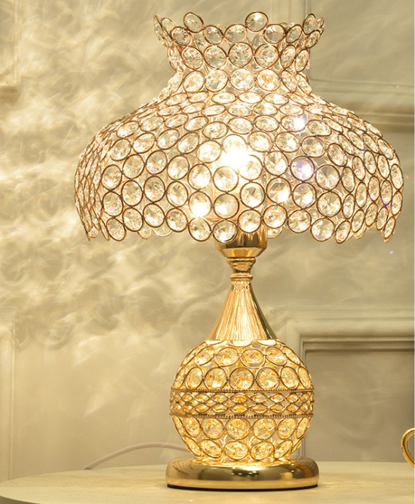 Luxury crystal table lamp with gold finish and dome-shaped shade, 40x25 cm, featuring elegant crystal detailing and warm ambient glow