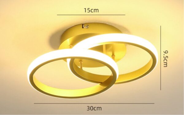 Golden twin-ring LED flush mount ceiling light with soft white glow and modern design
