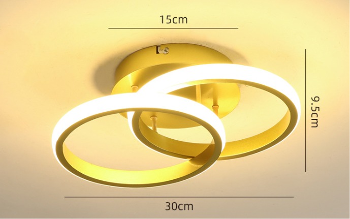 Golden twin-ring LED flush mount ceiling light with soft white glow and modern design