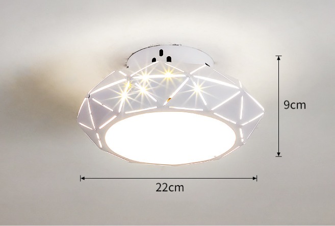 White geometric crystal-style flush mount ceiling light with LED glow