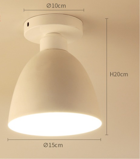 White dome-shaped ceiling light fixture with flush mount design and soft glow
